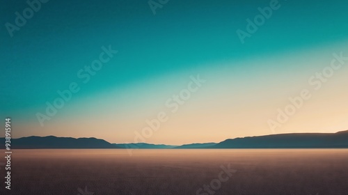 Vast desert landscape under a gradient sky, blending deep blue and golden hues, symbolizing solitude.