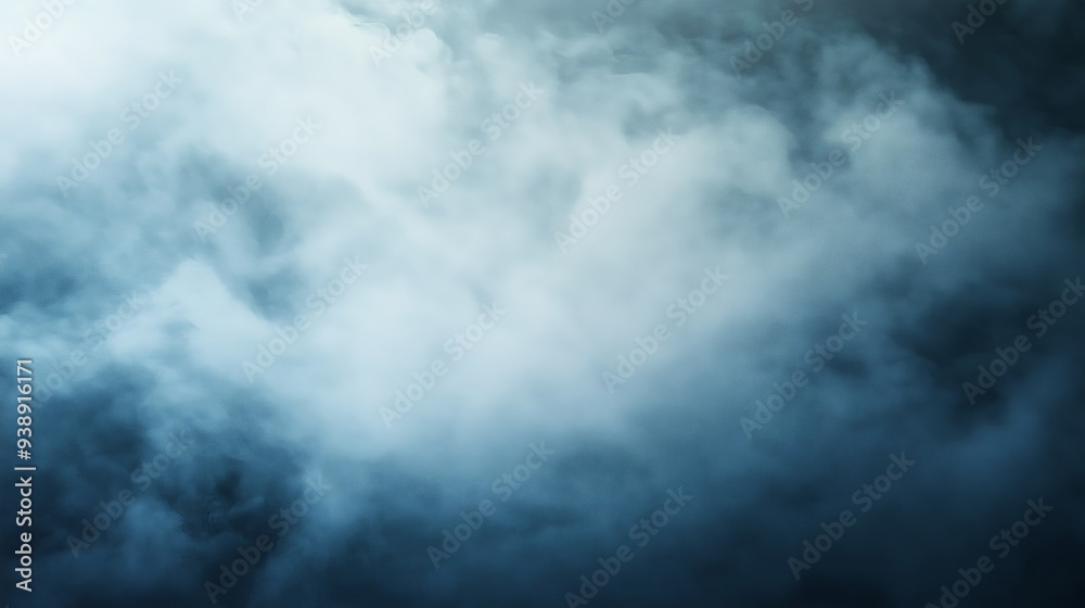 Mysterious swirling fog creating an abstract and atmospheric background in shades of blue and gray.
Mysterious swirling fog creating an abstract and atmospheric background in shades of blue and gray.