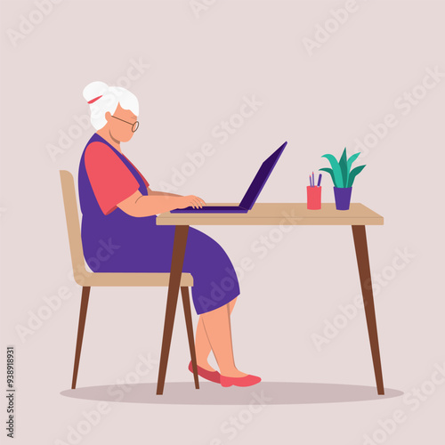 Side View Of A Elderly Woman Sitting At A Desk While Using Laptop.