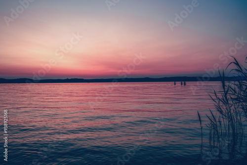 Sunset on Balaton in summer season. photo