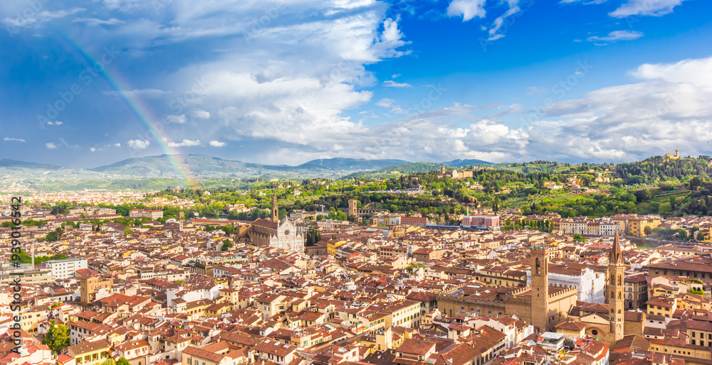 Panoramic view over the historic city and rainbow in Florence, Italy