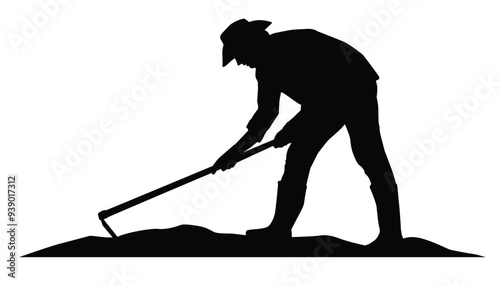 Silhouette of farmer hoeing the soil