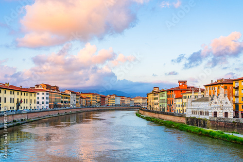 Colorful houses and church Santa Maria della Spina on the banks of river Arno in Pisa, Tuscany, Italy