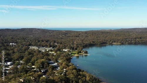 Raffertys resort on Lake Macquarie at Murrays beach town of Australia – aerial 4k.
 photo