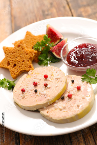 Fototapeta Naklejka Na Ścianę i Meble -  foie gras slices with gingerbread bread slice in star shape and onion dip
