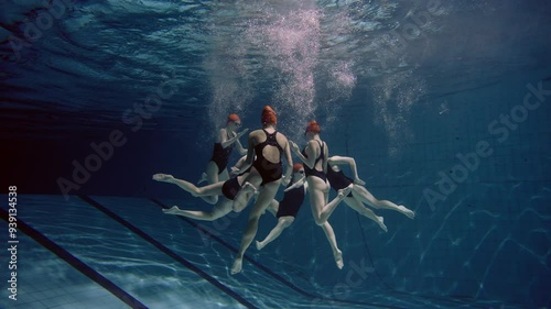 Underwater shot of six women