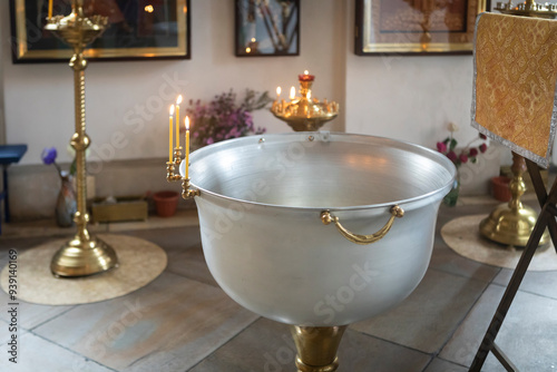 A close-up shot of a baptismal font in an Orthodox church. Preparing for baptism.