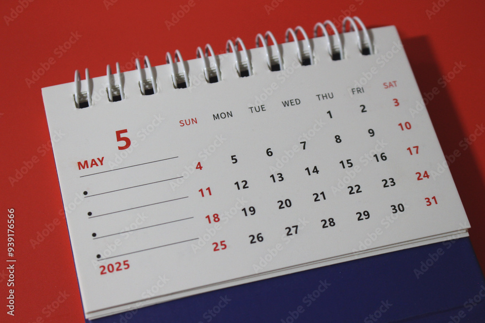 Monthly calendar template for the new year 2025 desk calendar,on red background.