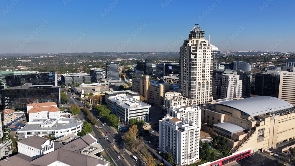 Fototapeta premium Sandton Skyline At Johannesburg In Gauteng South Africa. Sandton Landscape. Financial District Background. Johannesburg At Gauteng South Africa. High Rise Buildings. Mandela Square.