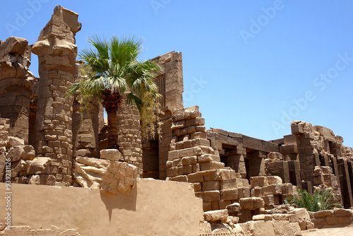 Ruins of Karnak Temple Complex in Ancient Egypt With Hieroglyphs and Palm Trees