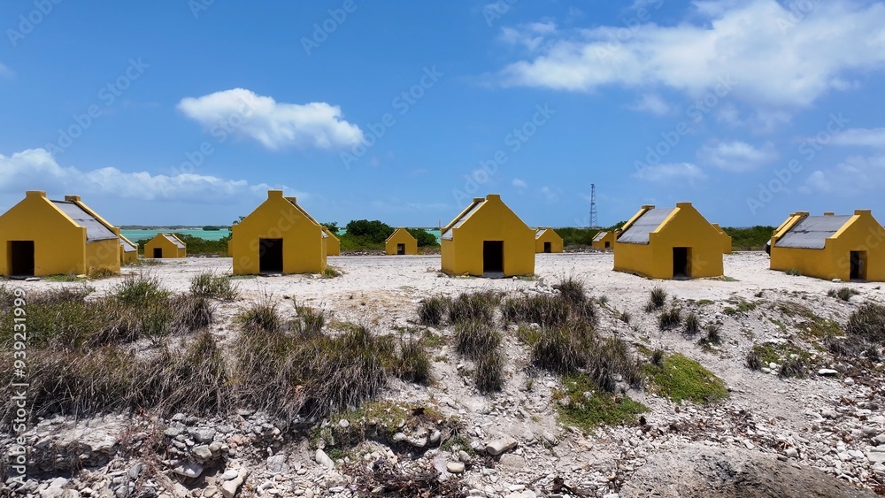 Red Slave Huts At Kralendijk In Bonaire Netherlands Antilles. Island Beach. Blue Sea Landscape. Kralendijk At Bonaire Netherlands Antilles. Tourism Background. Nature Seascape. Red Slave Huts At Kralendijk In Bonaire Netherlands Antilles. Island Beach. Blue Sea Landscape. Kralendijk At Bonaire Netherlands Antilles. Tourism Background. Nature Seascape.