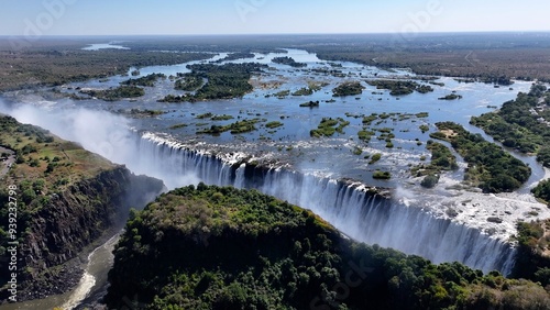 Victoria Falls At Livingstone In Northern Rhodesia Zambia. Nature Waterfall. Zambezi River Landscape. Livingstone At Northern Rhodesia Zambia. Southern Africa. Tourism Travel. photo