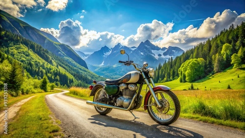 Vibrant vintage motorcycle parked on a scenic valley road surrounded by lush greenery and majestic mountains under a bright blue sky.