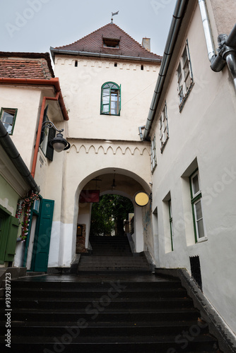 Fototapeta Naklejka Na Ścianę i Meble -  Cityscape, architecture, building, town, city, medieval, ancient, Eyes of Sibiu, Ochii din Sibiu, iconic, eyebrow, dormers, eye, windows, roof, The City with Eyes, historical center, clock, old town, 