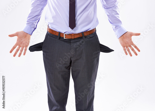 Hands, poor or businessman with empty pockets for bankruptcy, debt or investment fail. Poverty, broke worker or financial crisis, economic depression or unemployed isolated on white studio background