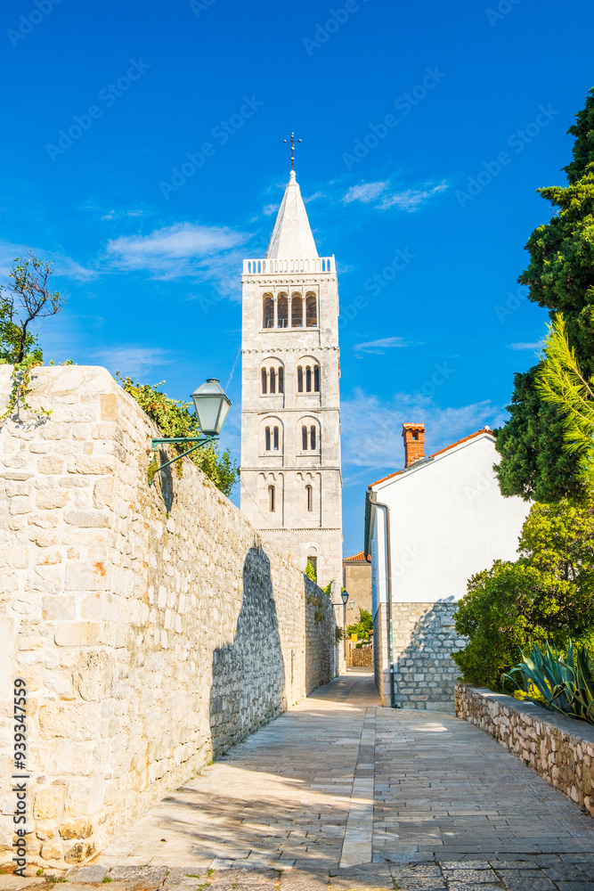 Street and cathedral tower view in town of Rab, Croatia