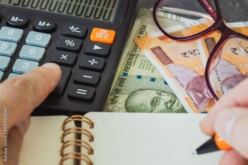 Financial settlements in Indian rupees, Financial analysis, Tax calculation, Risk costs, business project. India money, close up.