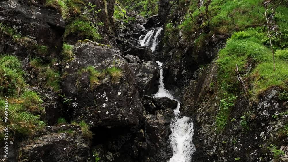 Irish spring waterfall green rocky cascading river Irish spring waterfall green rocky cascading river