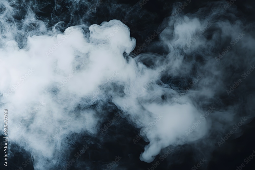 The image is of a thick, dark cloud of smoke with a white background The image is of a thick, dark cloud of smoke with a white background