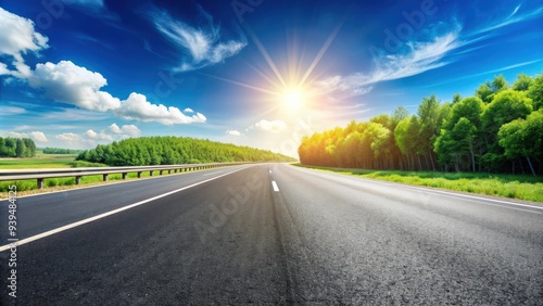 Asphalt road on a sunny day with clear blue sky , transportation, travel, journey, highway, infrastructure, perspective