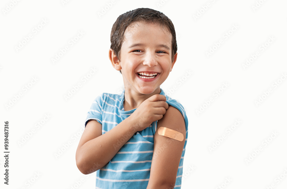 Portrait, happy and kid with plaster in studio isolated on a white background.Face, smile and boy child with bandage after vaccine, injury or wound for healthcare, first aid and excited Portrait, happy and kid with plaster in studio isolated on a white background.Face, smile and boy child with bandage after vaccine, injury or wound for healthcare, first aid and excited