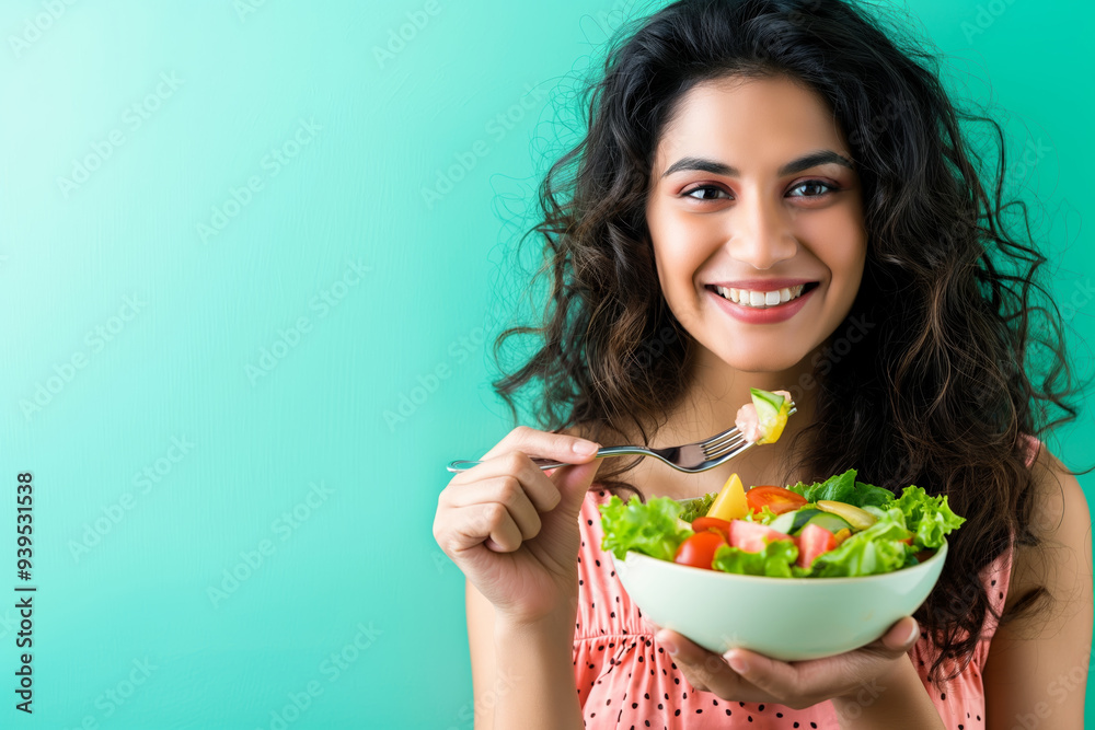 Smiling Woman Eating Fresh Salad Against Turquoise Background Healthy Lifestyle Concept Smiling Woman Eating Fresh Salad Against Turquoise Background Healthy Lifestyle Concept