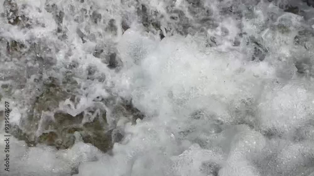 Close-Up of Bubbling Whitewater Rapids Flowing Over Rocks in a Fast-Moving Stream Capturing the Dynamic Motion and Energy of Fresh Water in Nature Close-Up of Bubbling Whitewater Rapids Flowing Over Rocks in a Fast-Moving Stream Capturing the Dynamic Motion and Energy of Fresh Water in Nature
