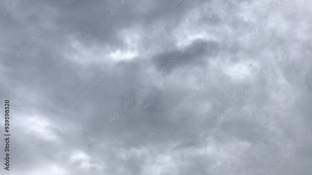 Moody Overcast Sky with Dense Gray Clouds Slowly Drifting, Creating a Somber and Atmospheric Backdrop in the Early Morning or Late Evening, Perfect for Reflective or Mysterious Cinematic Scenes Moody Overcast Sky with Dense Gray Clouds Slowly Drifting, Creating a Somber and Atmospheric Backdrop in the Early Morning or Late Evening, Perfect for Reflective or Mysterious Cinematic Scenes