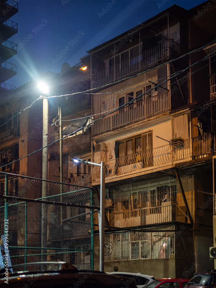facade of old ahouse in Tbilisi city in night