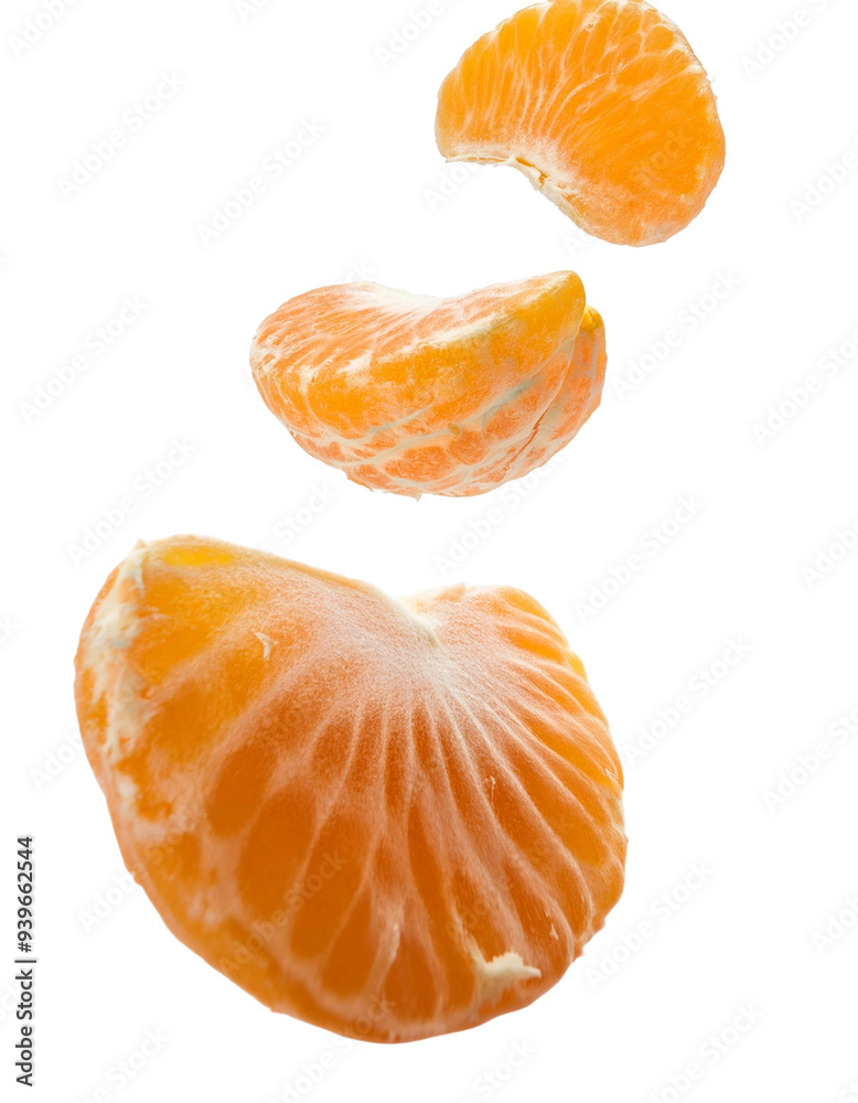 Slices of Tangerine Falling Isolated on White. Slices of Tangerine Falling Isolated on White.