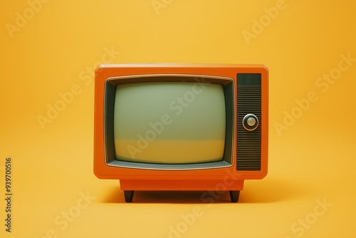 A vintage orange television set sits on a yellow background. The television is turned off and the screen is blank photo