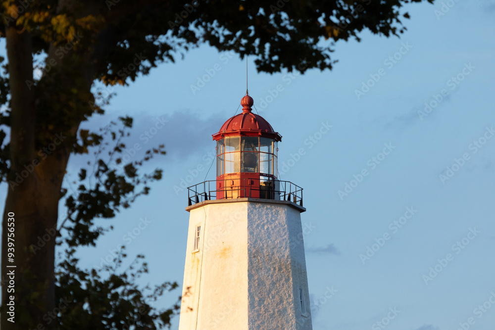 The historic Sandy Hook Lighthouse is seen at Sunset on a summers day in August 2024 The historic Sandy Hook Lighthouse is seen at Sunset on a summers day in August 2024