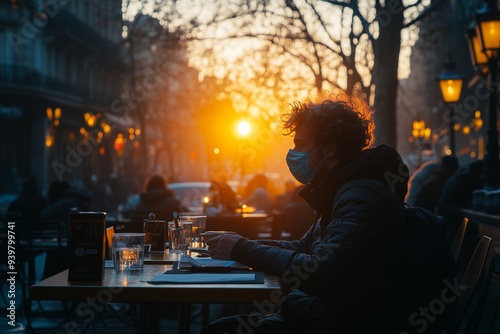 Man with Safety Mask from Epidemic and in the Autumn Cafe: Protecting Health in a Pandemic