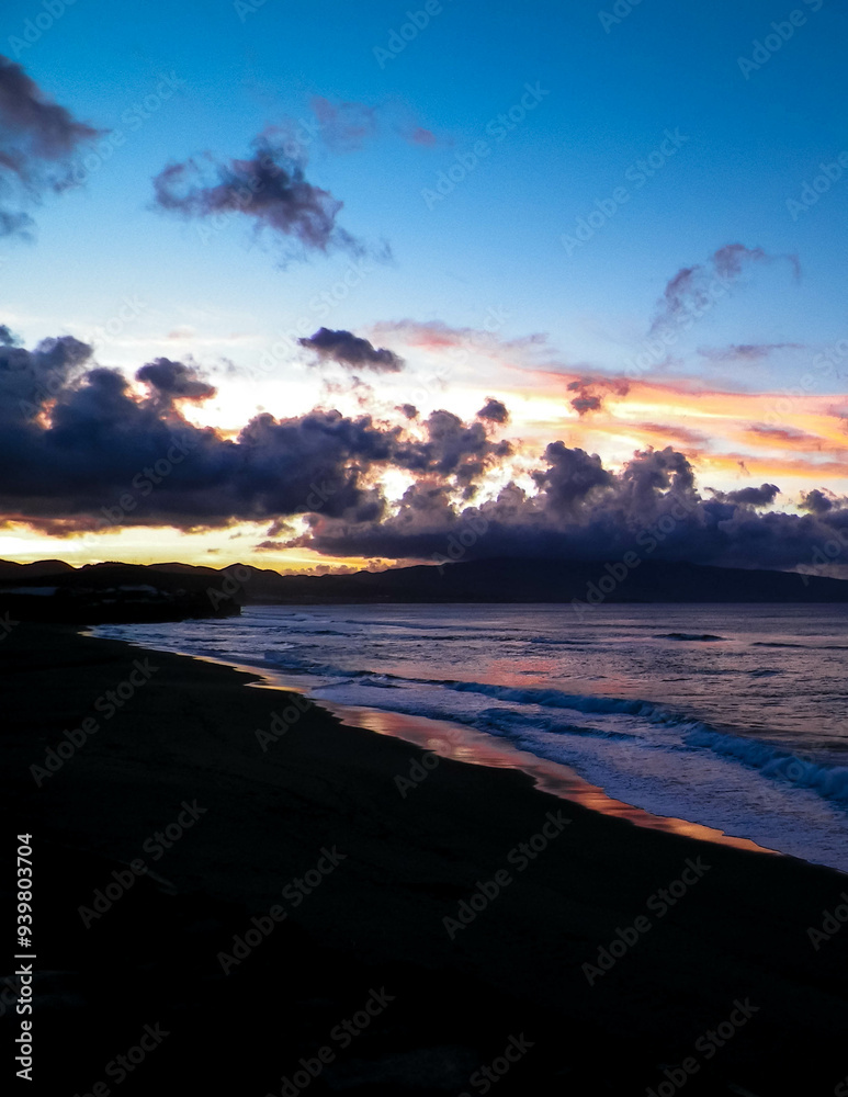 Fototapeta premium Beautiful sunset over beach in Ribiera Grande, Atlantic Ocean, Azores Islands.