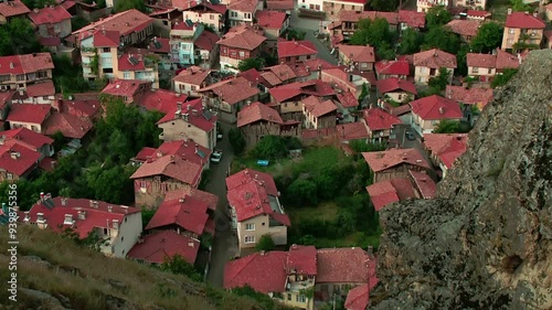 View of the town from the top, town and red brick roofs among the rocks, Iskilip Corum Turkey photo