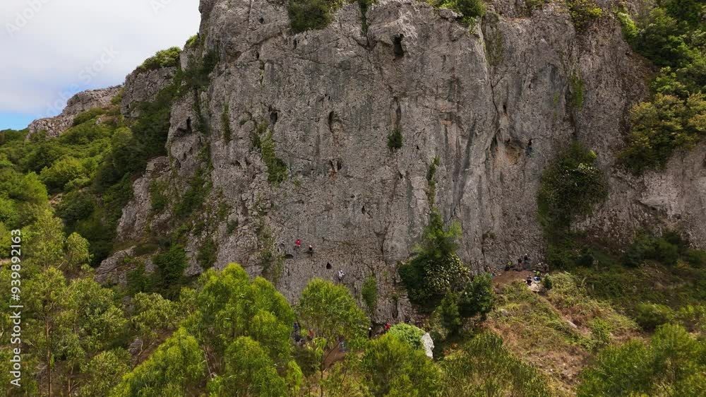 Rock Climbers are Climbing in Serra de Montejunto. Aerial View. Orbiting Rock Climbers are Climbing in Serra de Montejunto. Aerial View. Orbiting