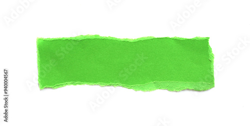 green ripped paper on a white background