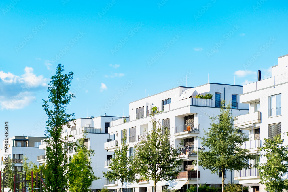 Fototapeta premium Contemporary residential buildings, community with lush greenery, modern architecture and well-maintained landscape, New apartment buildings