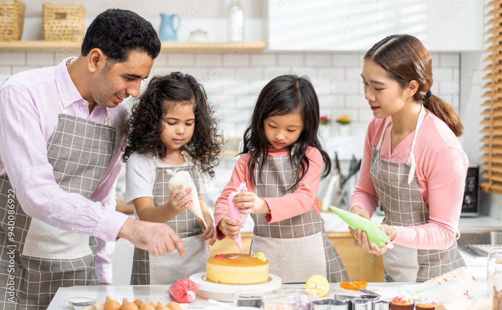 Portrait of enjoy happy love asian family father and mother with little asian girl daughter child play and having fun cooking food together with baking cookie and cake ingredient in kitchen Portrait of enjoy happy love asian family father and mother with little asian girl daughter child play and having fun cooking food together with baking cookie and cake ingredient in kitchen