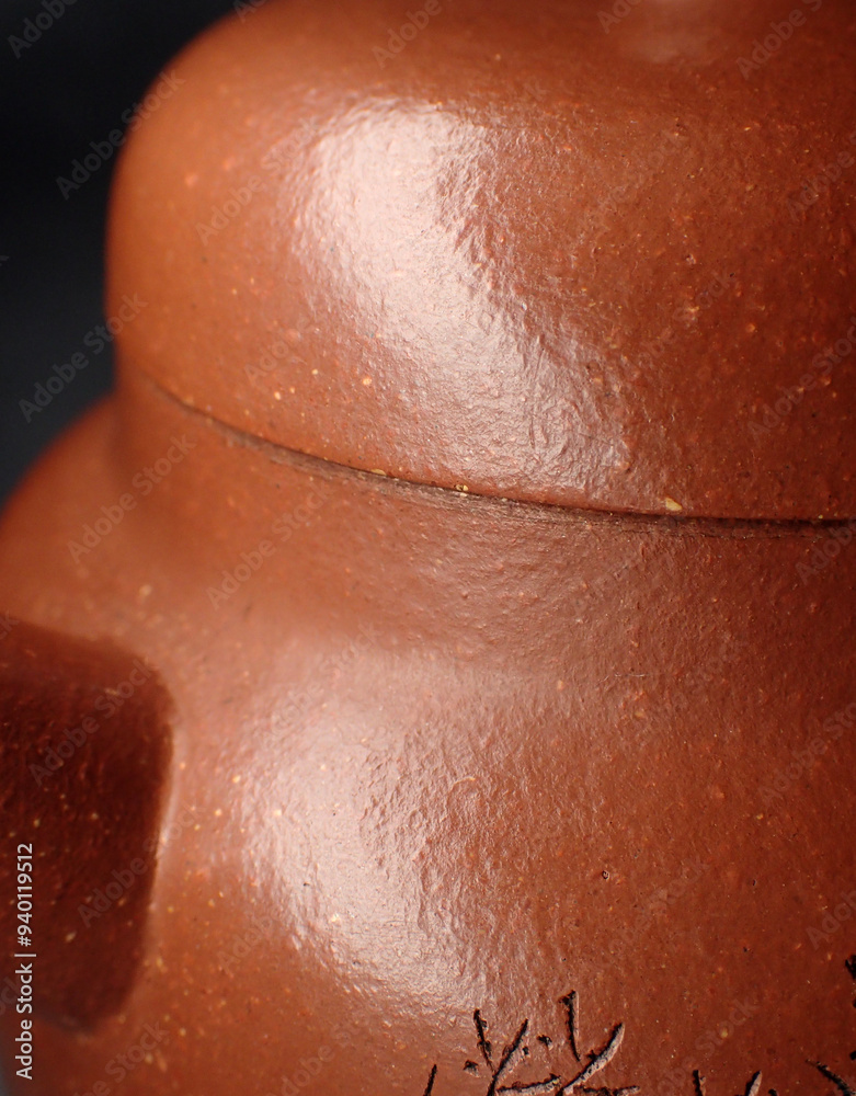 Closeup of a purple clay teapot, traditional Chinese tea culture Closeup of a purple clay teapot, traditional Chinese tea culture