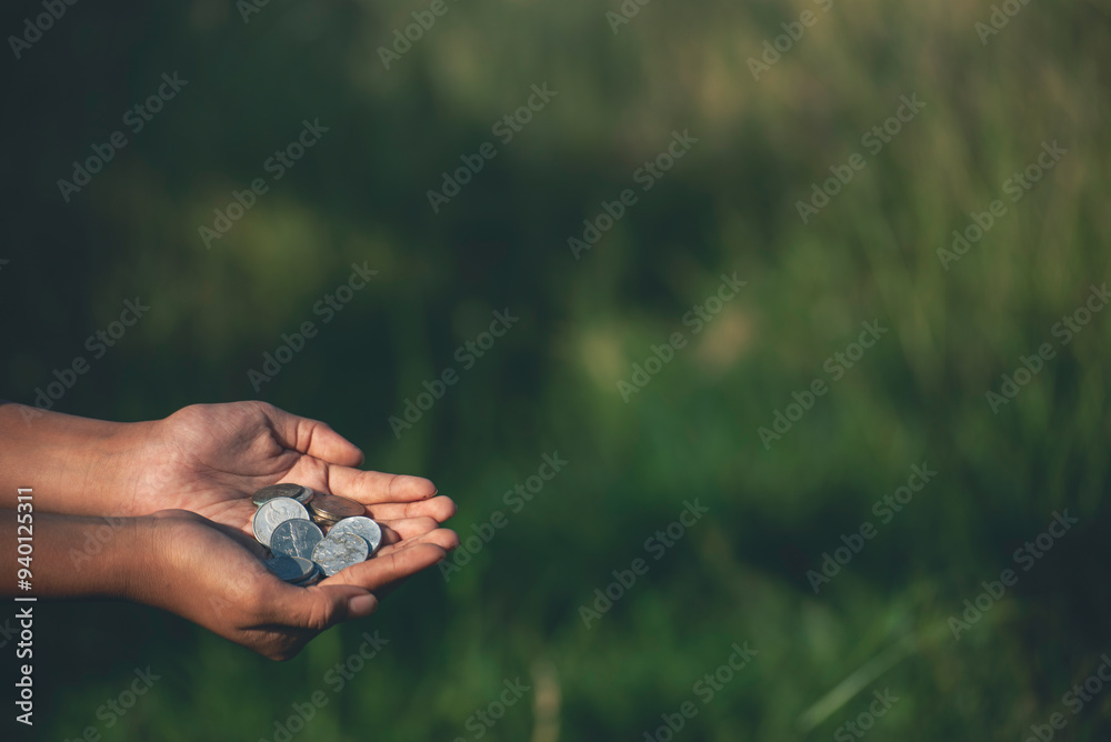 Fototapeta premium Financial Planner hand holding coin stack growing economy. Hands Protect Debt loan home financial plan coin stack. Money Investment advice plan budget banking insurance sustainable green background