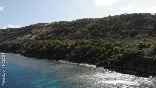 beautiful sea and landsace at raja sua island, moyo island indonesia. traveling concept with sea and hill, Wanderlust Chronicles: Explore the World's Hidden Gems. drone view photo