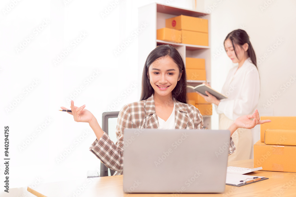 SME owner, female entrepreneur Read and write order number Receiving and checking online orders to prepare boxes for sale to customers. Business idea. SME owner, female entrepreneur Read and write order number Receiving and checking online orders to prepare boxes for sale to customers. Business idea.