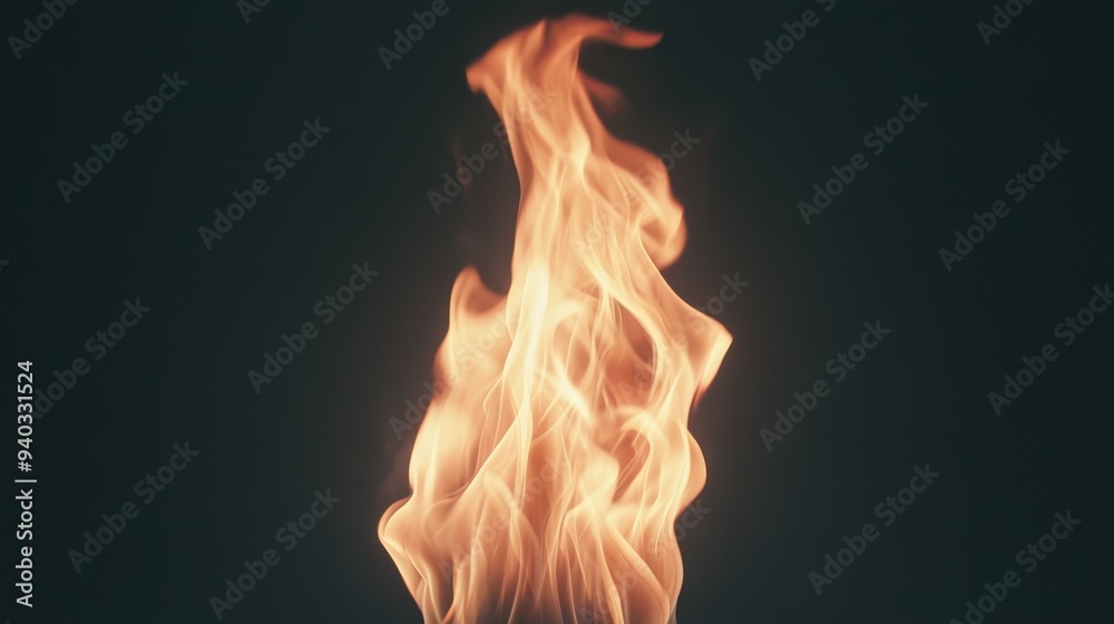 A close up of a flame with a dark background A close up of a flame with a dark background