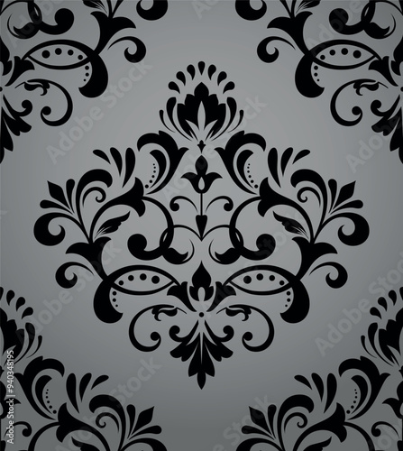 Floral pattern. Vintage wallpaper in the Baroque style. Seamless vector background. Gray and black ornament for fabric, wallpaper, packaging. Ornate Damask flower ornament