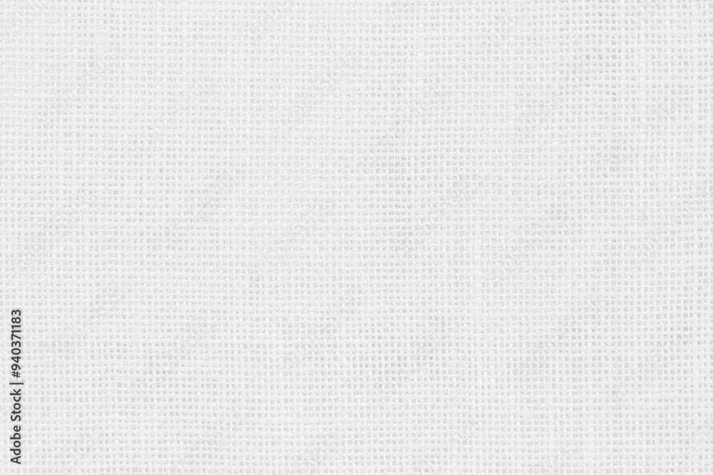 Fototapeta premium Jute hessian sackcloth woven texture pattern background in light white color textile. White canvas fabric, linen cotton cloth rough texture background of watercolour paper craft blank cardboard empty.