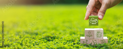 Wooden block for co2, ESG and net zero. Carbon reduction strategy and action to limit climate change and global warming. world environment day, world earth day. green business photo