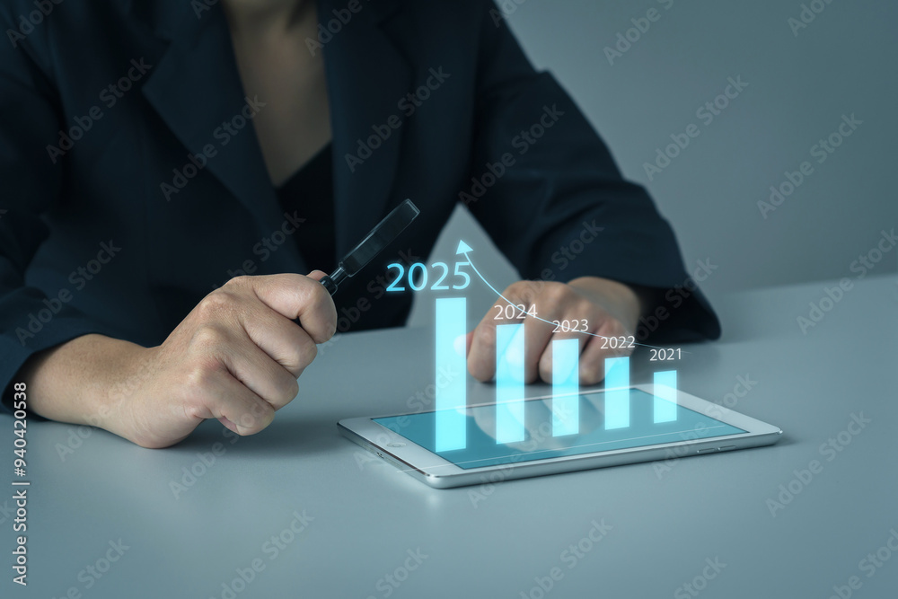 Strategic Planning for 2025, businessman delves into data to outline business goals for 2025, focusing on investments and strategic actions that pave the way for sustained growth. Strategic Planning for 2025, businessman delves into data to outline business goals for 2025, focusing on investments and strategic actions that pave the way for sustained growth.