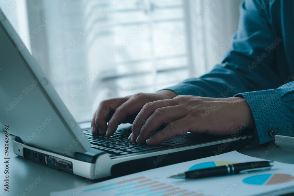 Home work concept. Person typing on laptop keyboard. It includes business documents, finding information, business planning and using AI computer technology. Home work concept. Person typing on laptop keyboard. It includes business documents, finding information, business planning and using AI computer technology.