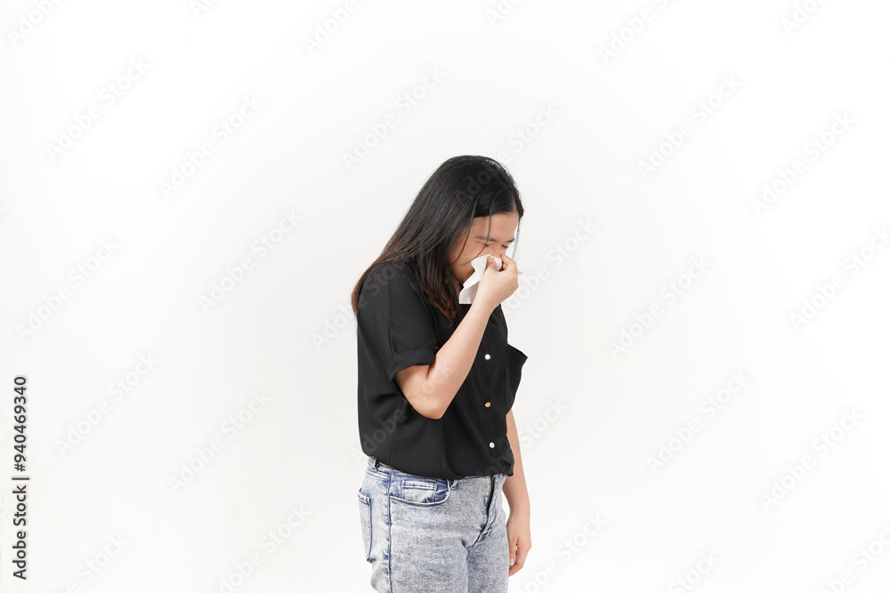 Young Asian woman suffering flu hand holding tissue wearing Black t-shirt and jeans isolated on white background Young Asian woman suffering flu hand holding tissue wearing Black t-shirt and jeans isolated on white background